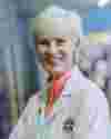 Judy Murray Smiling Wearing Lab Coat